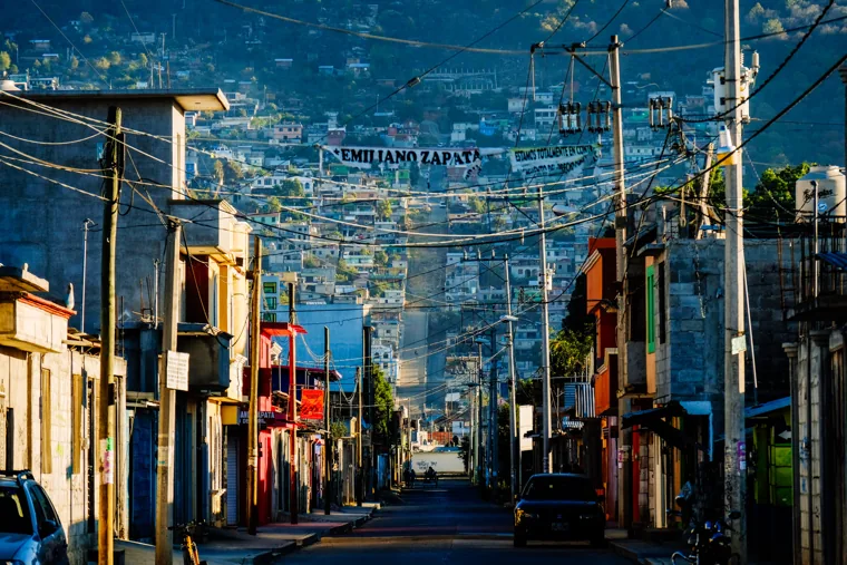 A street with a mountain backdrop